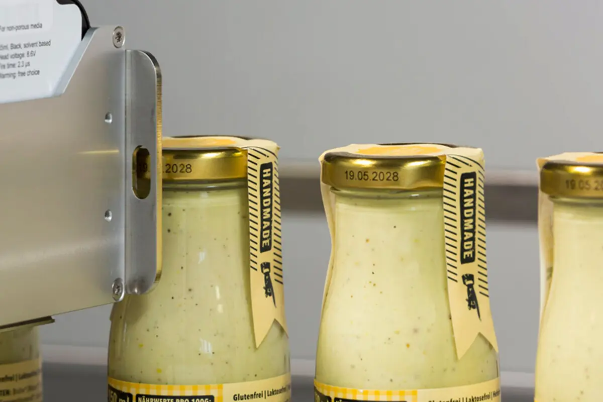 Inkjet printing on metal bottle caps