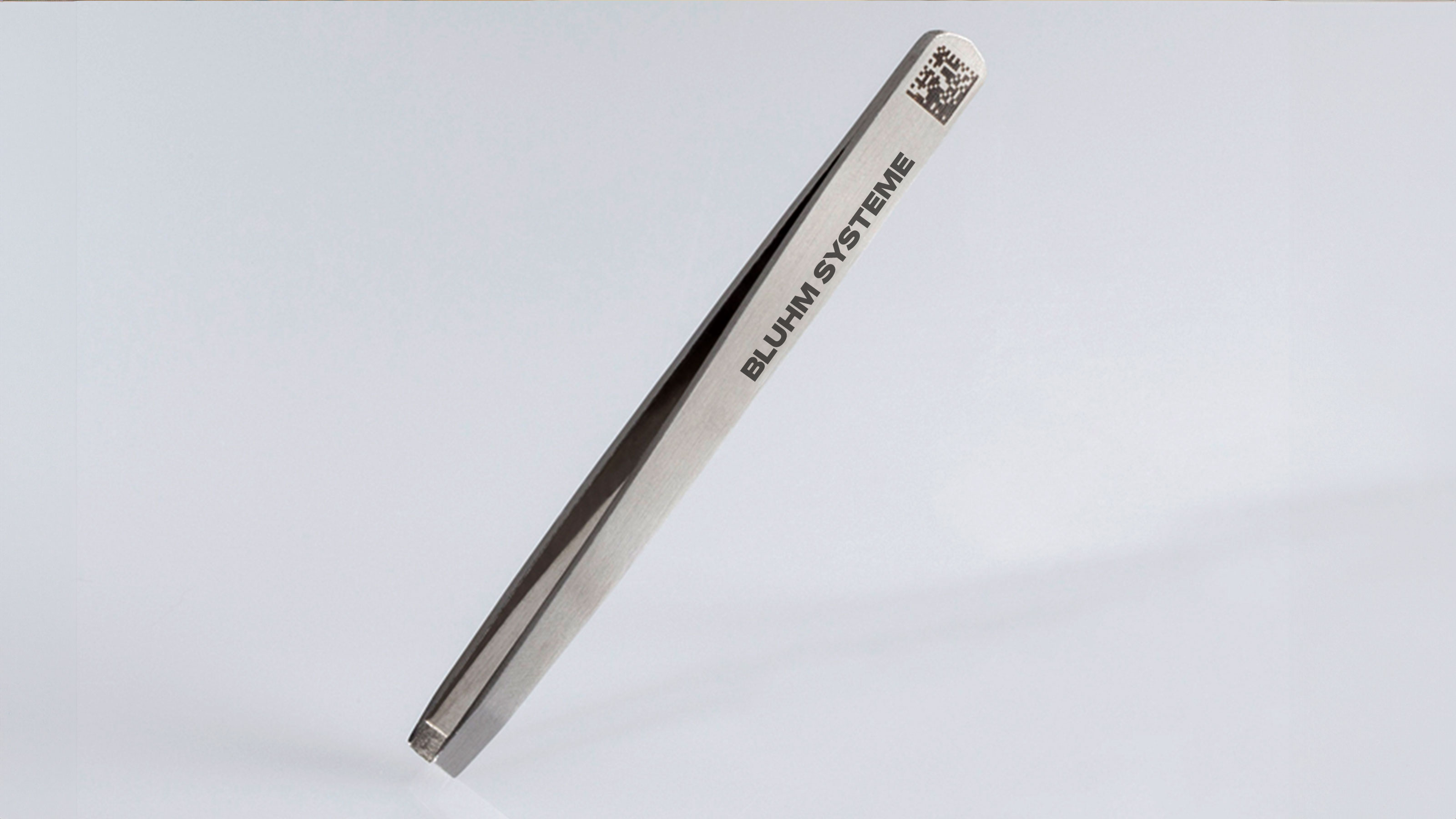 Laser marking on metal tweezers