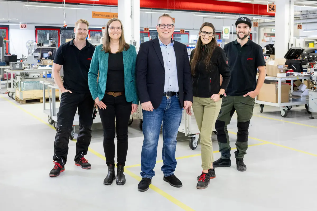 Weber Marking Systems employees with CEO Volker Bluhm